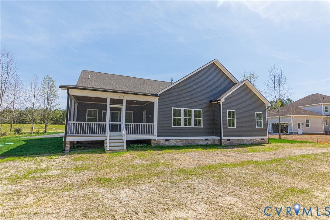 8860 Emily Jane Place, Quinton, VA 23141 The property features a screened-in porch with white railings and steps, and a dark grey exterior with white trim