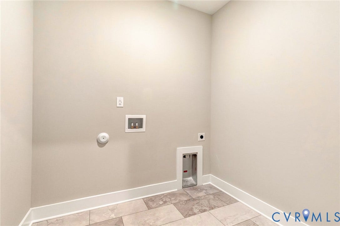 8860 Emily Jane Place, Quinton, VA 23141 Utility room with light-colored walls and tiled flooring, featuring a wall outlet and plumbing hookups