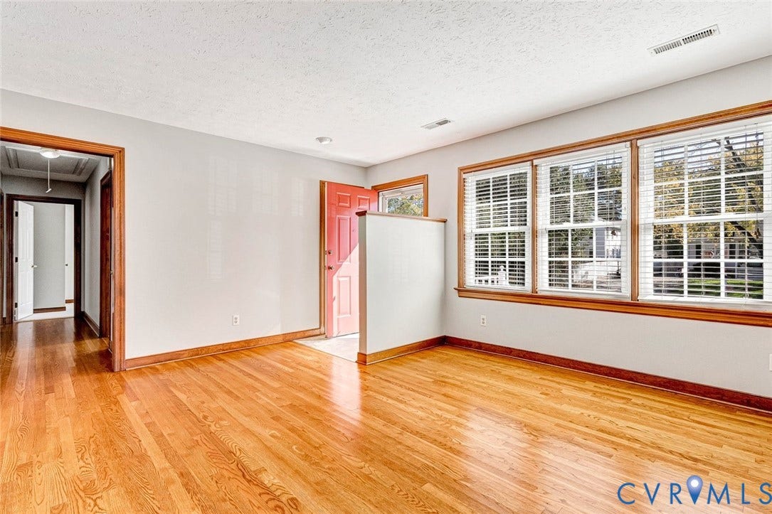 6432 Bellflower Circle, Mechicsville, Mechanicsville, VA 23111 Wood-finish flooring, multi-pane windows with wood-trim casings, and a half-height partition wall