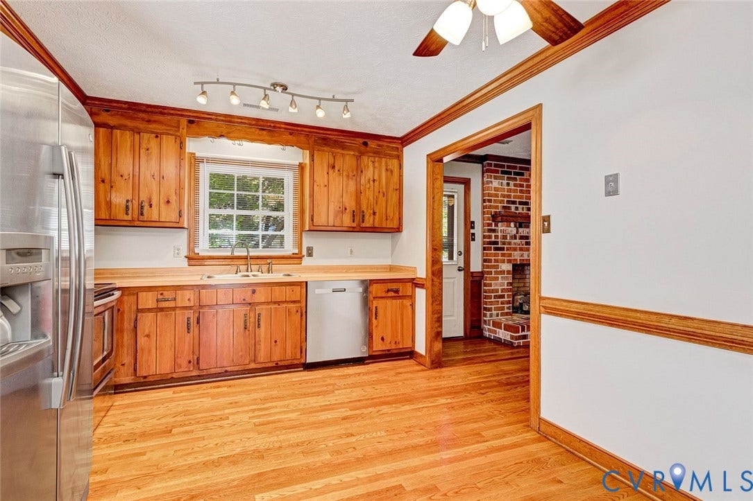 6432 Bellflower Circle, Mechicsville, Mechanicsville, VA 23111 Kitchen featuring wood cabinetry, stainless steel appliances, wood-finish flooring, crown molding, and recessed track lighting
