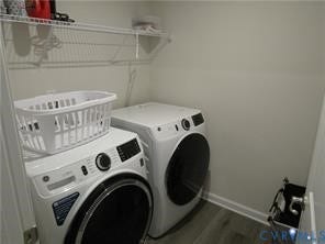 2210 Palm Court, Sandston, VA 23150 Laundry closet featuring wood-finish flooring and integrated wire shelving