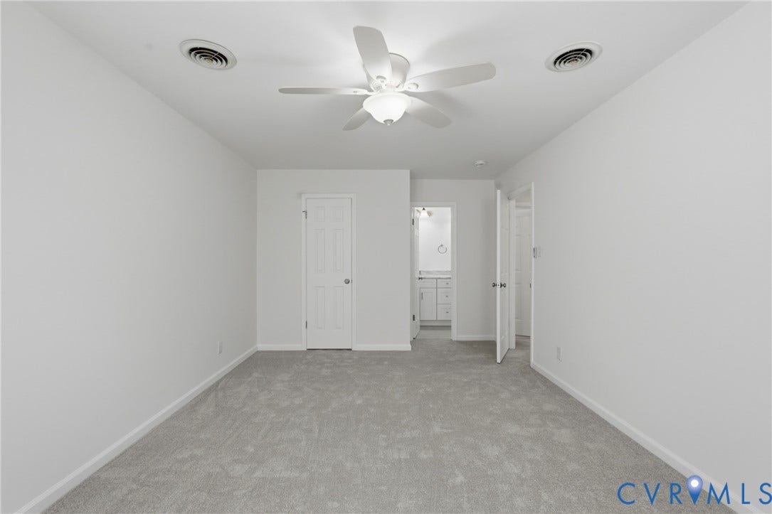 12506 Mandolin Drive, Chesterfield, VA 23113 Neutral-toned carpeting, ceiling-mounted paddle fan with integrated lighting