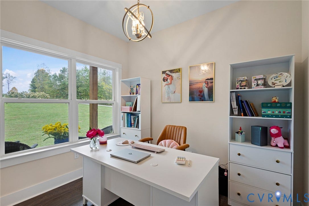 360 Anderson Mill Drive, Anderson Mill, Bumpass, VA 23024 Room featuring wood-finish flooring, a large multi-pane window, and a spherical gold-tone metal pendant light fixture