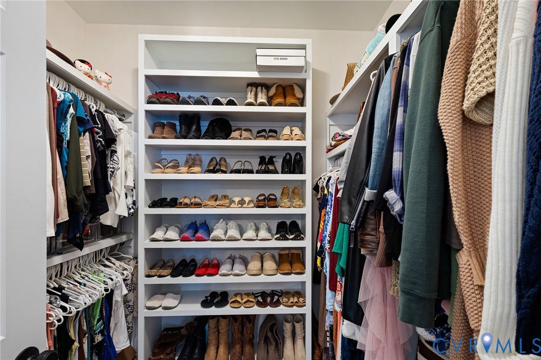 360 Anderson Mill Drive, Anderson Mill, Bumpass, VA 23024 Walk-in closet featuring custom white built-in shelving and integrated garment rods