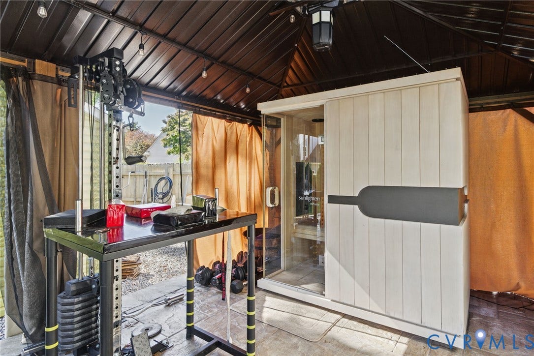 4504 Argonne Court, Glen Allen, VA 23060 Covered outdoor structure featuring a metal roof, integrated overhead lighting, and a sauna enclosure