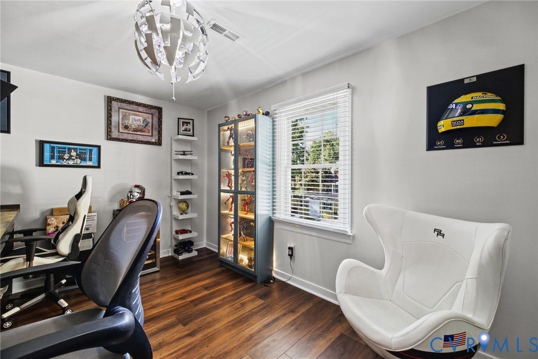 4504 Argonne Court, Glen Allen, VA 23060 Room interior featuring wood-finish flooring, a multi-pane window with white horizontal blinds, and a contemporary geometric pendant light fixture