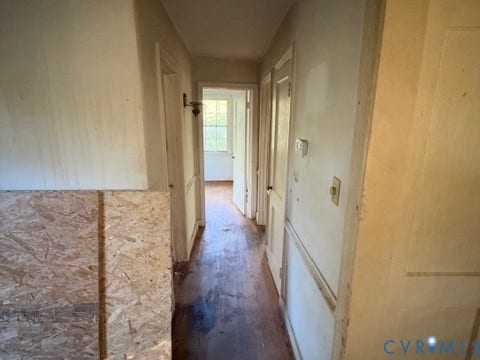 1330 Devers Road, Henrico, VA 23226 Hallway featuring wood-finish flooring, wainscoting, and a wall-mounted light fixture