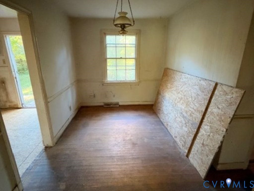 1330 Devers Road, Henrico, VA 23226 Hardwood flooring, wall-mounted pendant lighting, and multi-pane window with chair rail molding