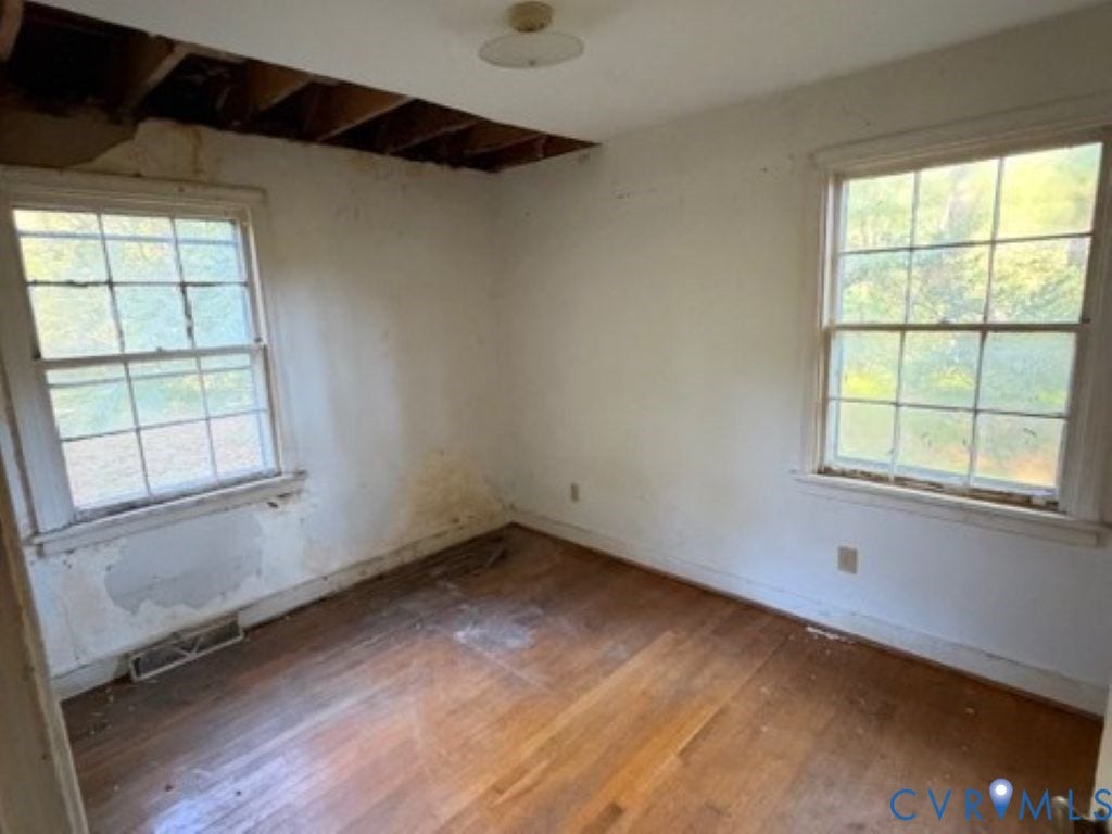 1330 Devers Road, Henrico, VA 23226 Room featuring wood-finish flooring, two multi-pane windows, and a semi-flush mount ceiling fixture