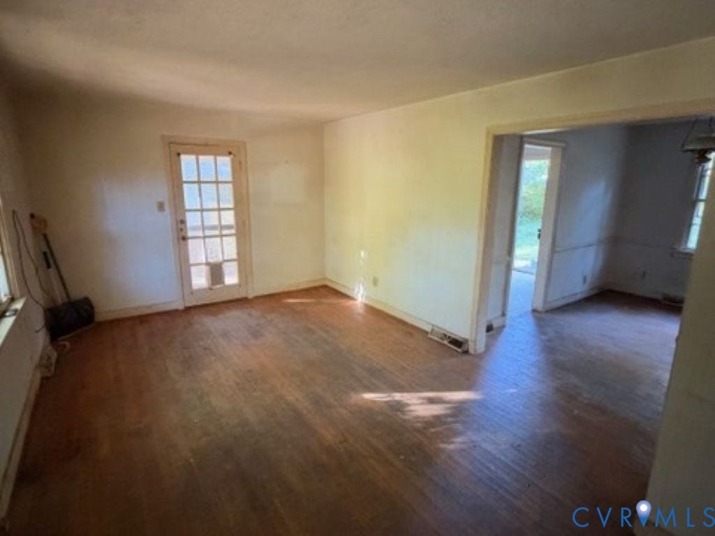 1330 Devers Road, Henrico, VA 23226 Wood-finish flooring, light-filled interior, and a nine-pane glass door leading to the exterior