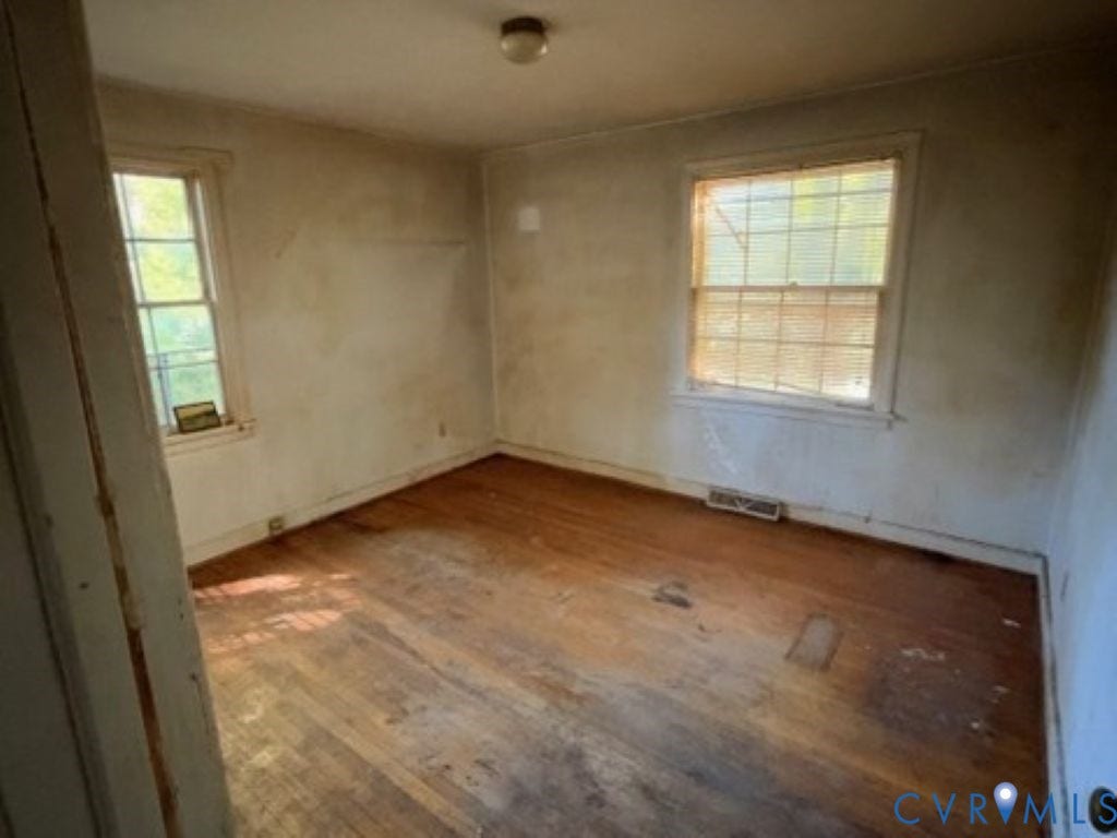 1330 Devers Road, Henrico, VA 23226 Room featuring wood-finish flooring, two multi-pane windows, and a ceiling-mounted light fixture