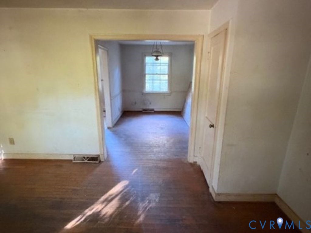 1330 Devers Road, Henrico, VA 23226 Interior featuring wood flooring, single-pane window, and wooden door with hardware