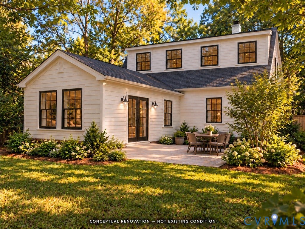 1330 Devers Road, Henrico, VA 23226 White horizontal siding exterior featuring dark-framed windows, double glass doors, a stone patio, and an asphalt shingle roof