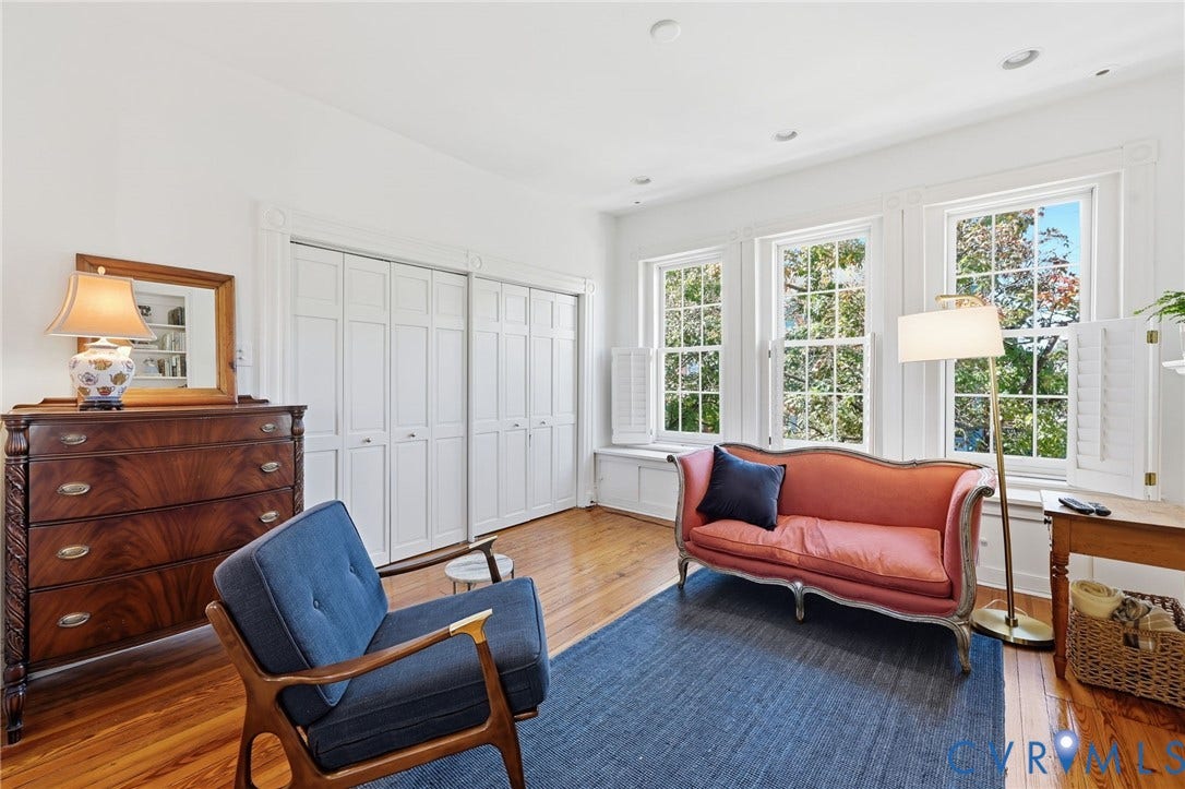 107 N Harvie Street, The Fan, Richmond, VA 23220 Wood-finish flooring, multi-panel sliding closet doors, recessed lighting, and large windows with interior shutters