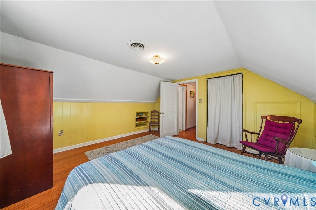 3030 Brentwood Circle, Chesterfield, VA 23237 Sloped ceilings, wood-finish flooring, paneled wall detailing, and built-in shelving