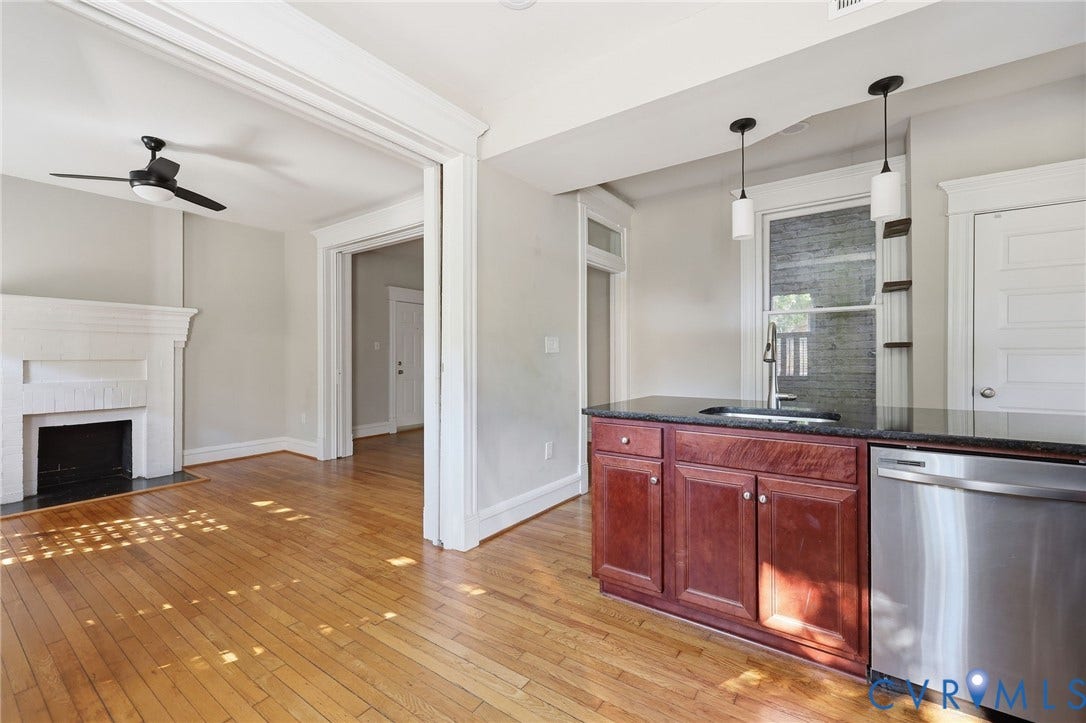 101 N Stafford Avenue, #U4, Stafford Terrace Condo, Richmond, VA 23220 Kitchen featuring dark cabinetry, stone-finish countertops, stainless steel dishwasher, and pendant lighting