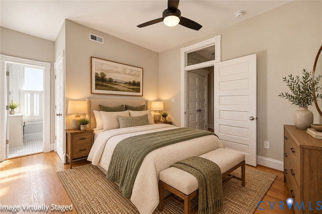 101 N Stafford Avenue, #U4, Stafford Terrace Condo, Richmond, VA 23220 Wood-finish flooring, high ceilings with an integrated ceiling fan, and multi-panel interior doors with transom windows