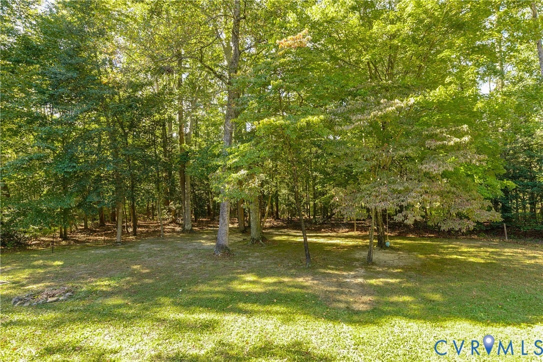 3800 Pheasant Hollow Drive, Henrico, VA 23231 Expansive lot featuring mature hardwood trees and perimeter woodland