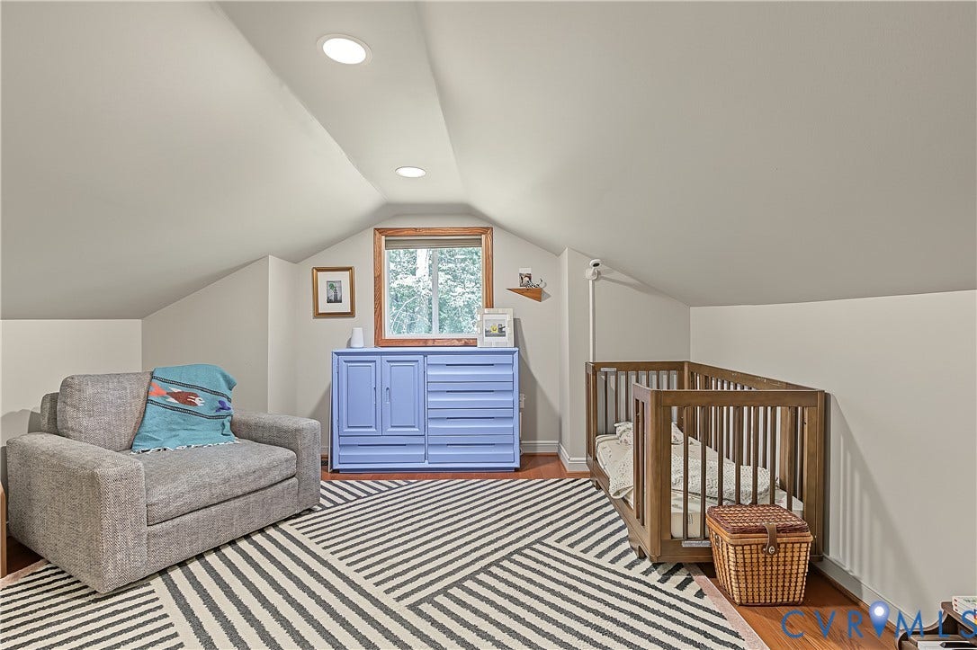 3800 Pheasant Hollow Drive, Henrico, VA 23231 Sloped ceilings, recessed lighting, wood-finish flooring, and a window with wood trim