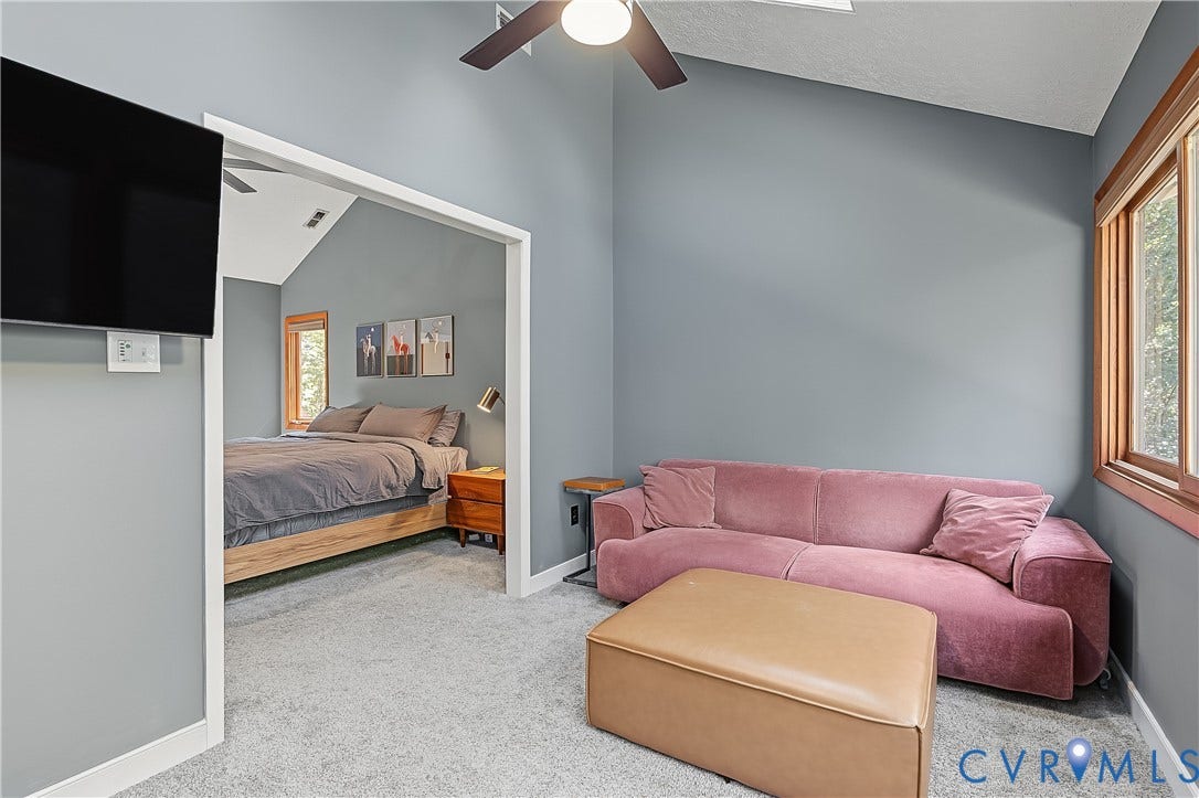 3800 Pheasant Hollow Drive, Henrico, VA 23231 Vaulted ceilings, carpeting, dual-tone window trim, and a ceiling fan with integrated lighting