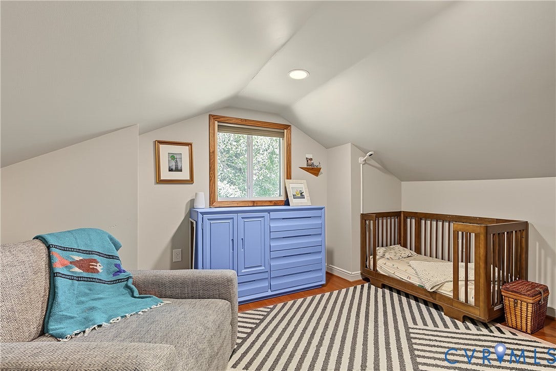 3800 Pheasant Hollow Drive, Henrico, VA 23231 Vaulted ceiling with recessed lighting, wood-finish flooring, and built-in cabinetry