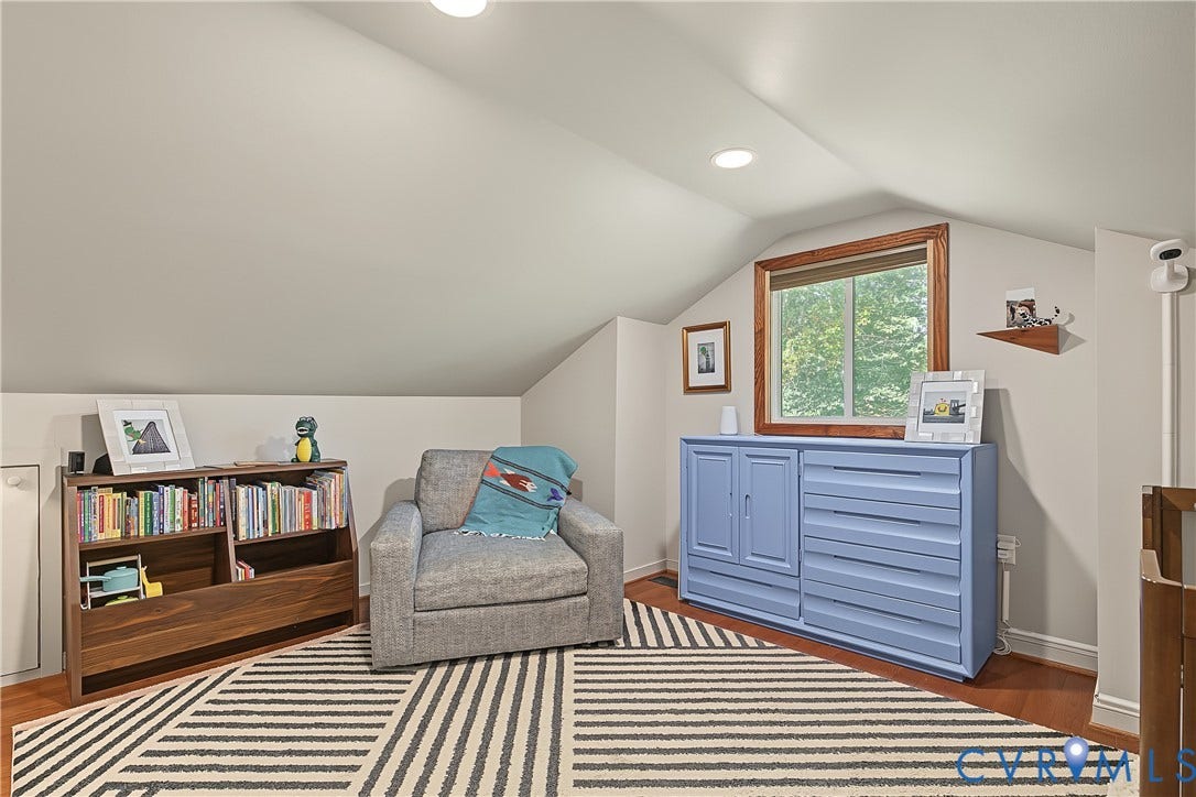 3800 Pheasant Hollow Drive, Henrico, VA 23231 Sloped ceilings, wood-finish flooring, and a window with wood trim