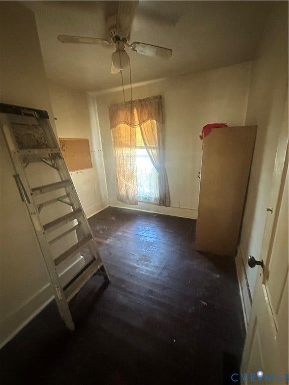 5 N Daisy Avenue, Henrico, VA 23075 Interior room featuring dark wood-finish flooring, a ceiling-mounted fan, and a single window with an integrated blind