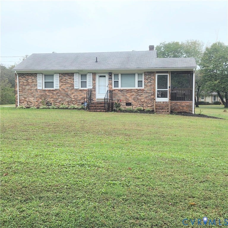 9005 Pine Hill Road, Hanover, VA 23116 Single-story brick exterior featuring a shingled roof, front-facing screened porch, metal railings, and a wide lawn