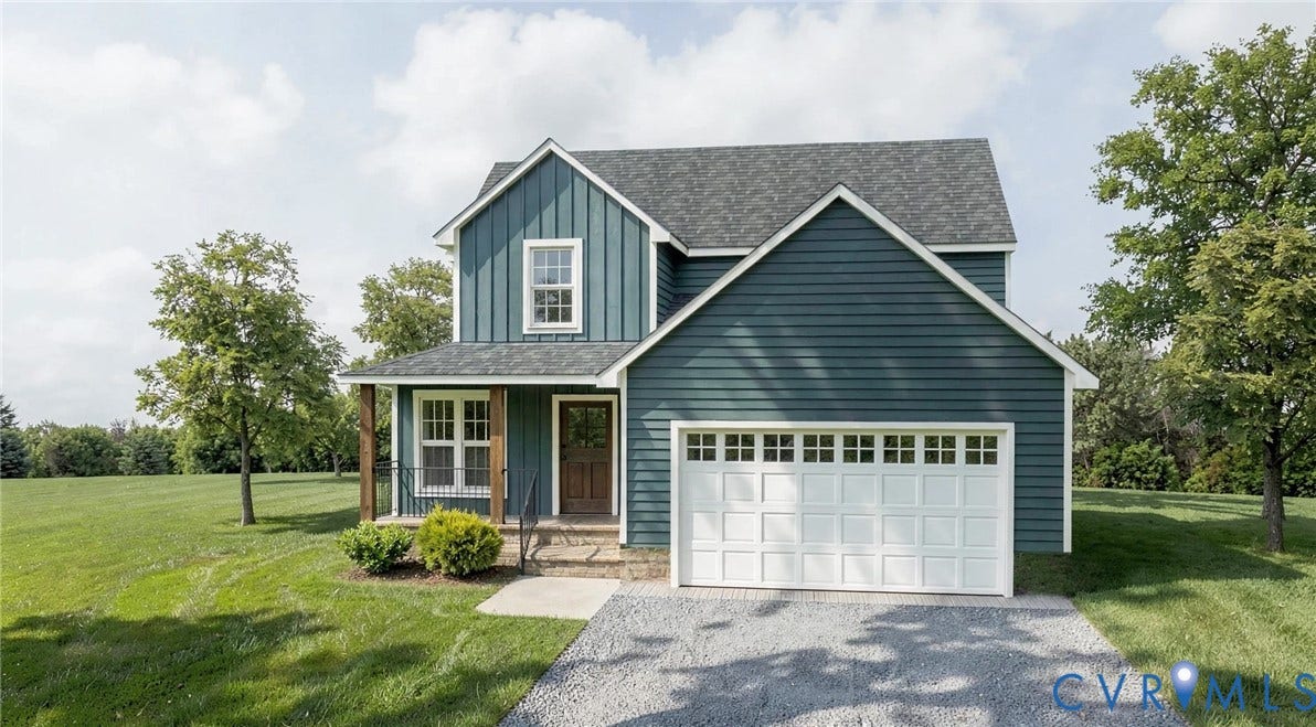 11571 Edinburgh Road, Glen Allen, VA 23060 Two-story home with a blue vertical and horizontal siding exterior, a front-facing attached two-car garage with white paneled doors, and a covered front porch featuring wood-post supports