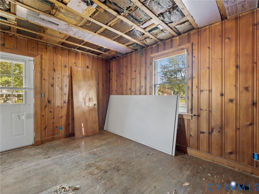 2900 Overton Road, Henrico, VA 23228 Wood-paneled wall finish, exposed ceiling joists, multi-pane window, and exterior-access door