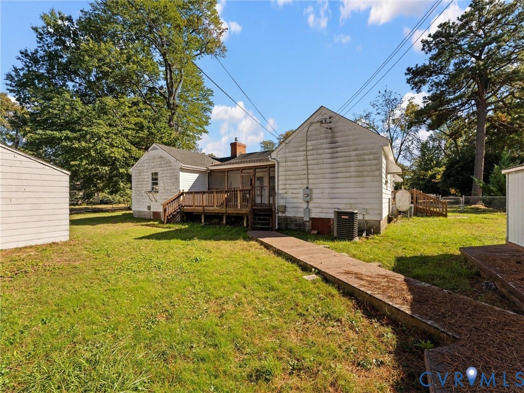 2900 Overton Road, Henrico, VA 23228 Exterior featuring horizontal siding, a wood deck with stairs, a concrete walkway, and an outdoor storage structure