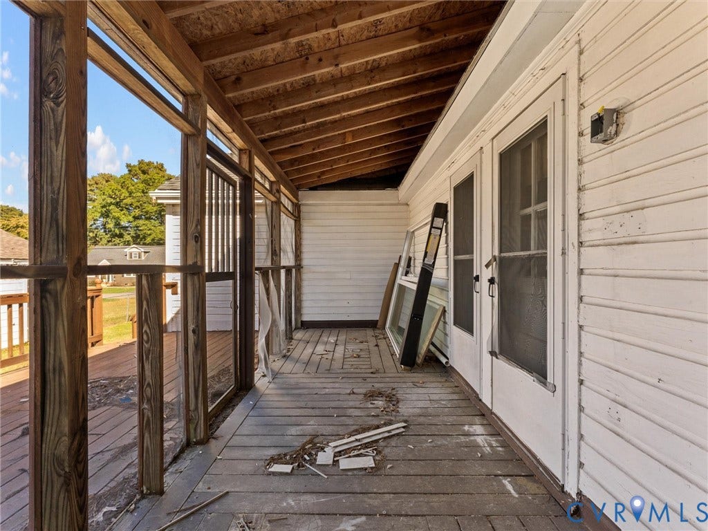 2900 Overton Road, Henrico, VA 23228 Screened-in porch featuring wood decking, exposed rafter ceiling, and dual screen entry doors