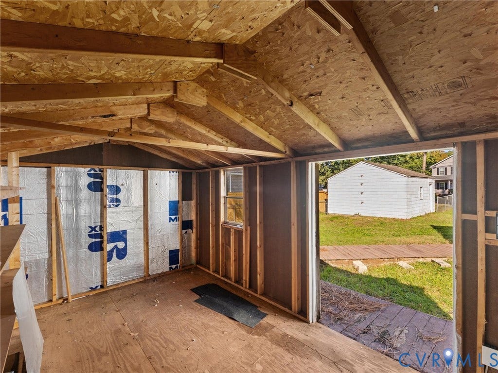 2900 Overton Road, Henrico, VA 23228 Outbuilding with exposed wood framing, metallic insulation panels, single-pane window, and exterior wood deck