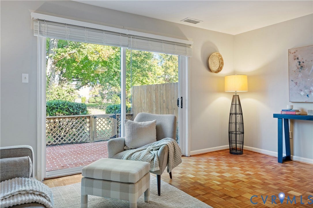 9131 Derbyshire Road, #B, Deerwood Condominiums, Henrico, VA 23229 Sliding glass door featuring horizontal blinds and parquet wood flooring