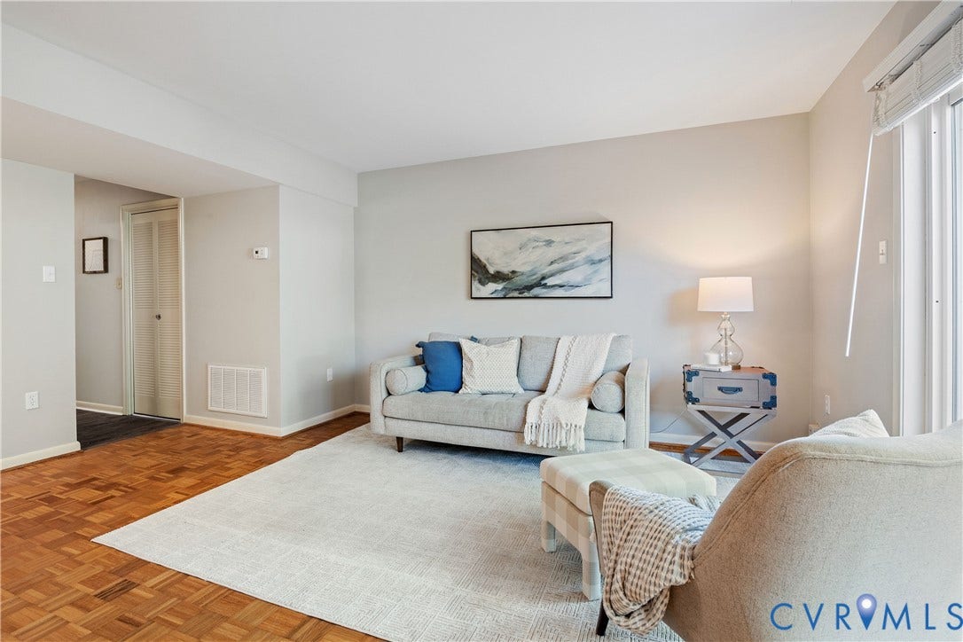 9131 Derbyshire Road, #B, Deerwood Condominiums, Henrico, VA 23229 Parquet wood-finish flooring and neutral-toned wall paint