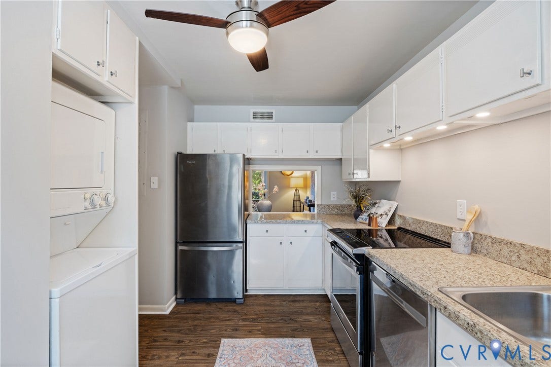 9131 Derbyshire Road, #B, Deerwood Condominiums, Henrico, VA 23229 Kitchen featuring white cabinetry, stone-finish countertops, stainless steel appliances, wood-finish flooring, and a ceiling fan