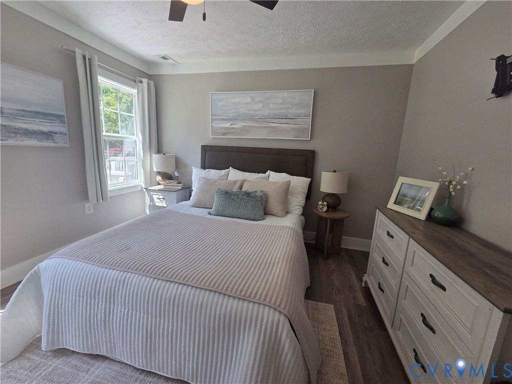7620 Cypress Drive, Lanexa, VA 23089 Wood-finish flooring, multi-pane window, and neutral wall tones