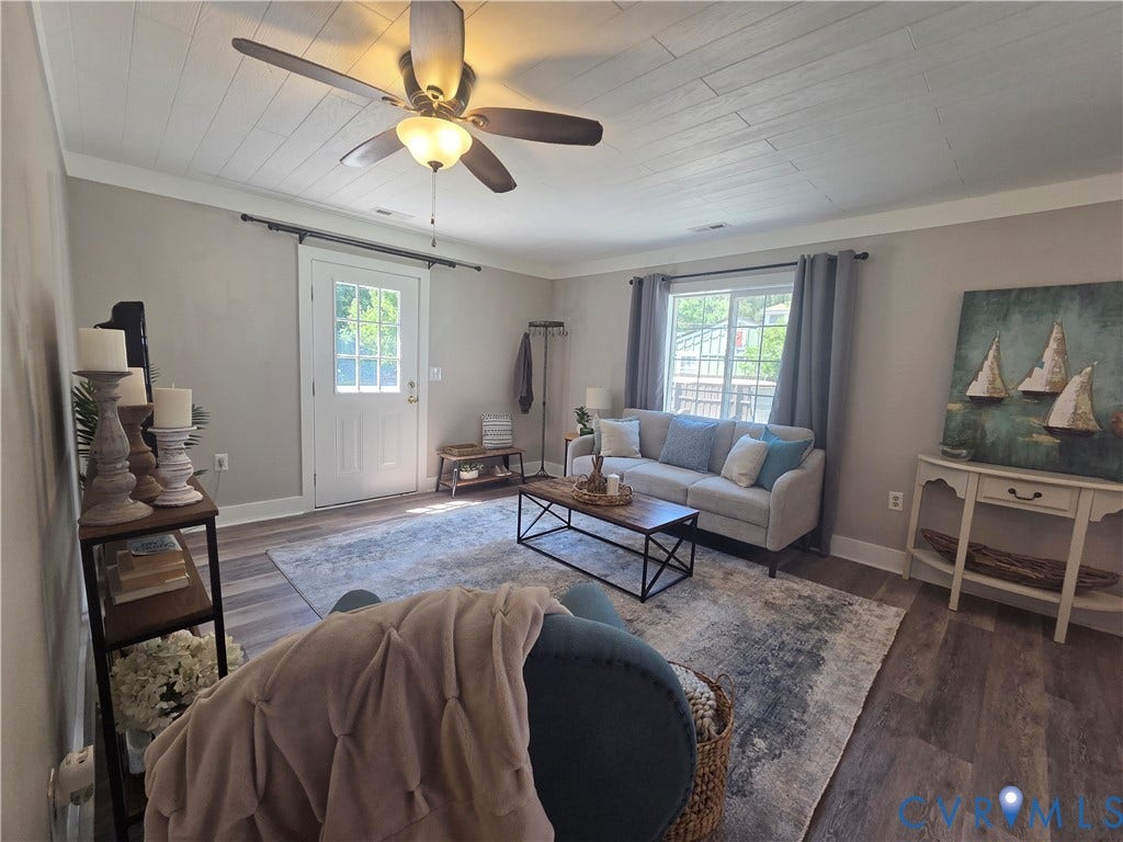 7620 Cypress Drive, Lanexa, VA 23089 Wood-finish flooring, white plank-style ceiling, and central ceiling fan with integrated light fixture
