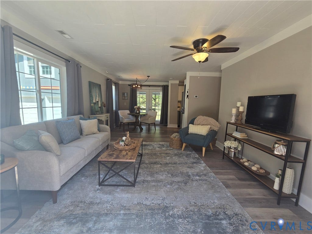 7620 Cypress Drive, Lanexa, VA 23089 Living area featuring wood-finish flooring, a ceiling fan with integrated lighting, and glass-paneled double doors