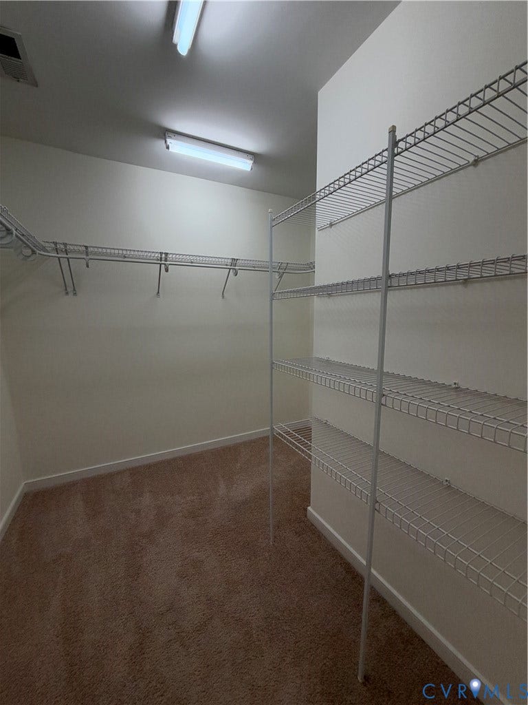 3105 Friars Walk Lane, Glen Allen, VA 23059 Walk-in storage space featuring neutral carpeting and tiered white wire shelving