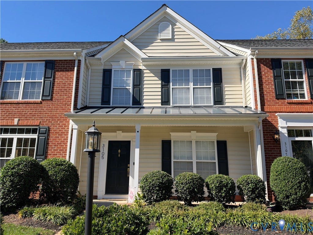 3105 Friars Walk Lane, Glen Allen, VA 23059 Multi-level exterior featuring a brick and horizontal siding facade, a covered front porch with a standing-seam metal roof, and dark window shutters