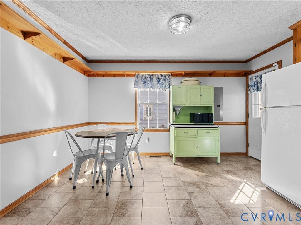 209 Taraby Drive, Hunters Run, Sandston, VA 23150 Tile flooring, natural wood crown molding, chair rail trim, and built-in wall shelving