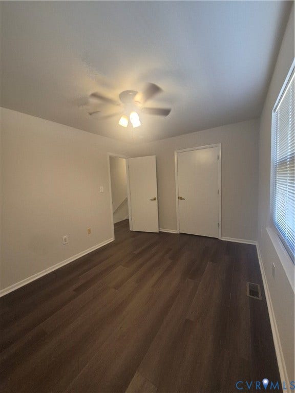17 Jarratt Court, Petersburg, VA 23803 Neutral interior featuring wood-finish flooring, white panel doors, and a ceiling-mounted light fixture with integrated fan