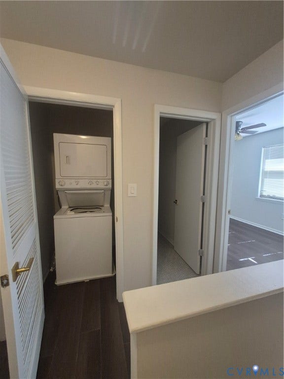 17 Jarratt Court, Petersburg, VA 23803 Dedicated laundry closet featuring a stackable washer and dryer, wood-finish flooring, and louvered door