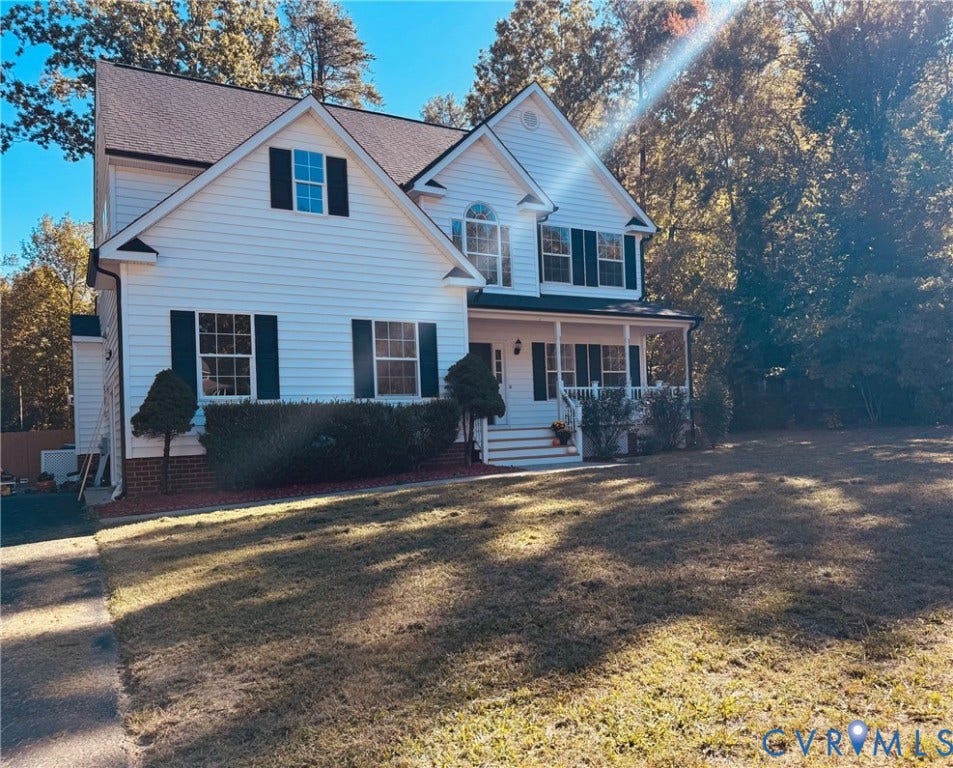 10984 Elmont Woods Drive, Elmont, Glen Allen, VA 23059 Professional Pictures - Coming Soon : Two-story traditional exterior featuring horizontal white siding, a covered front porch with white railing, and dark-toned shutters