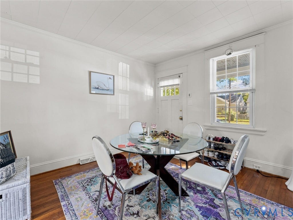 2305 Halifax Avenue, Oak Grove, Sandston, VA 23224 Room featuring wood-finish flooring, paneled ceiling, and a multi-pane window with exterior molding