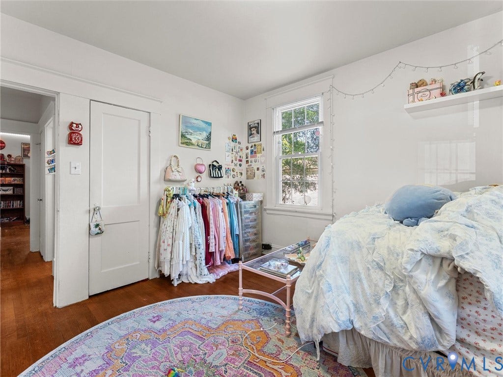 2305 Halifax Avenue, Oak Grove, Sandston, VA 23224 Wood-finish flooring, white-painted interior walls, single-hung window with casing, and a two-panel interior door
