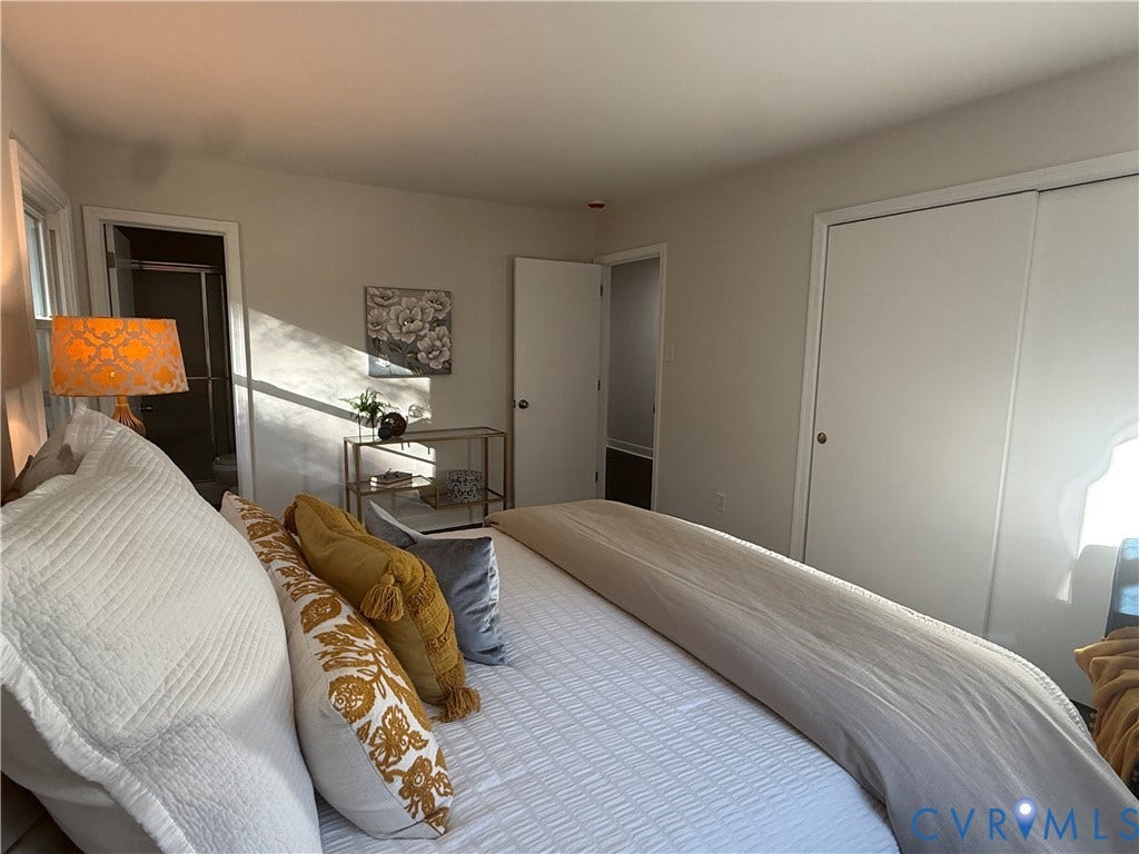 533 Williamsdale Drive, Midlothian, VA 23235 Neutral-toned interior featuring smooth-finish walls, ceiling-height dual sliding closet doors, and multiple interior passage doors