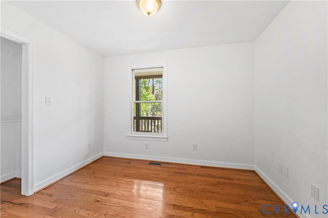 7040 Old Roxbury Road, Average, New Kent, VA 23141 Wood-finish flooring, neutral walls, flush-mount ceiling lighting, and single-hung window