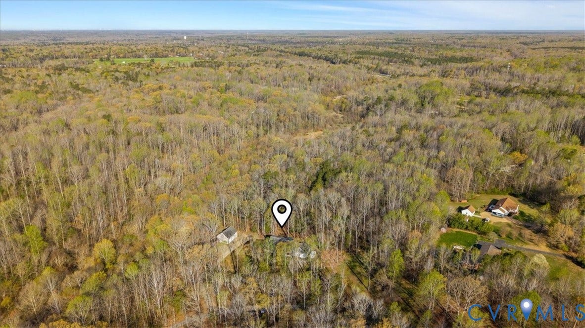 7040 Old Roxbury Road, Average, New Kent, VA 23141 Aerial perspective of a sprawling, wooded parcel featuring dense mature trees and a detached structure